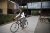 Stanford senior, Mariah Stackhouse, senior on the national championship golf team, takes her bike around campus from class to class.