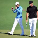 Paul Casey and amateur Bryson DeChambeau react on the second green during the first round of the 2016 Masters Tournament at Augusta National Golf Club.
