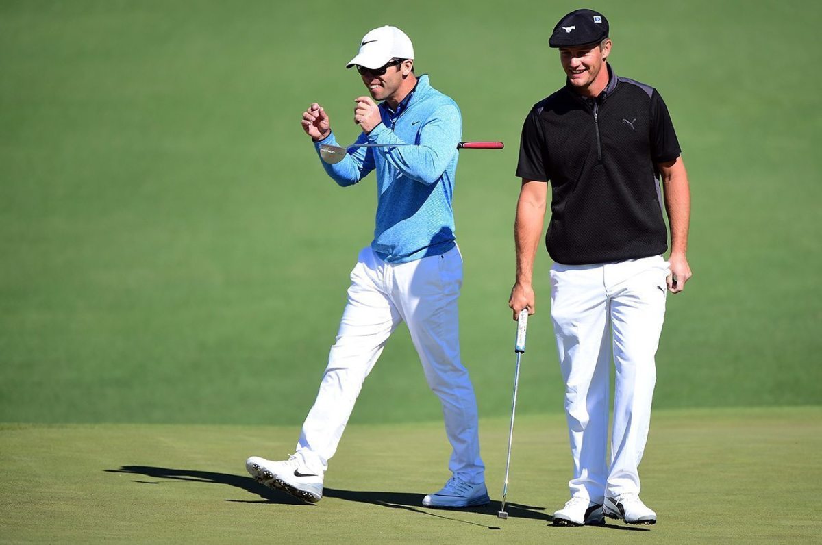Paul Casey and amateur Bryson DeChambeau react on the second green during the first round of the 2016 Masters Tournament at Augusta National Golf Club.