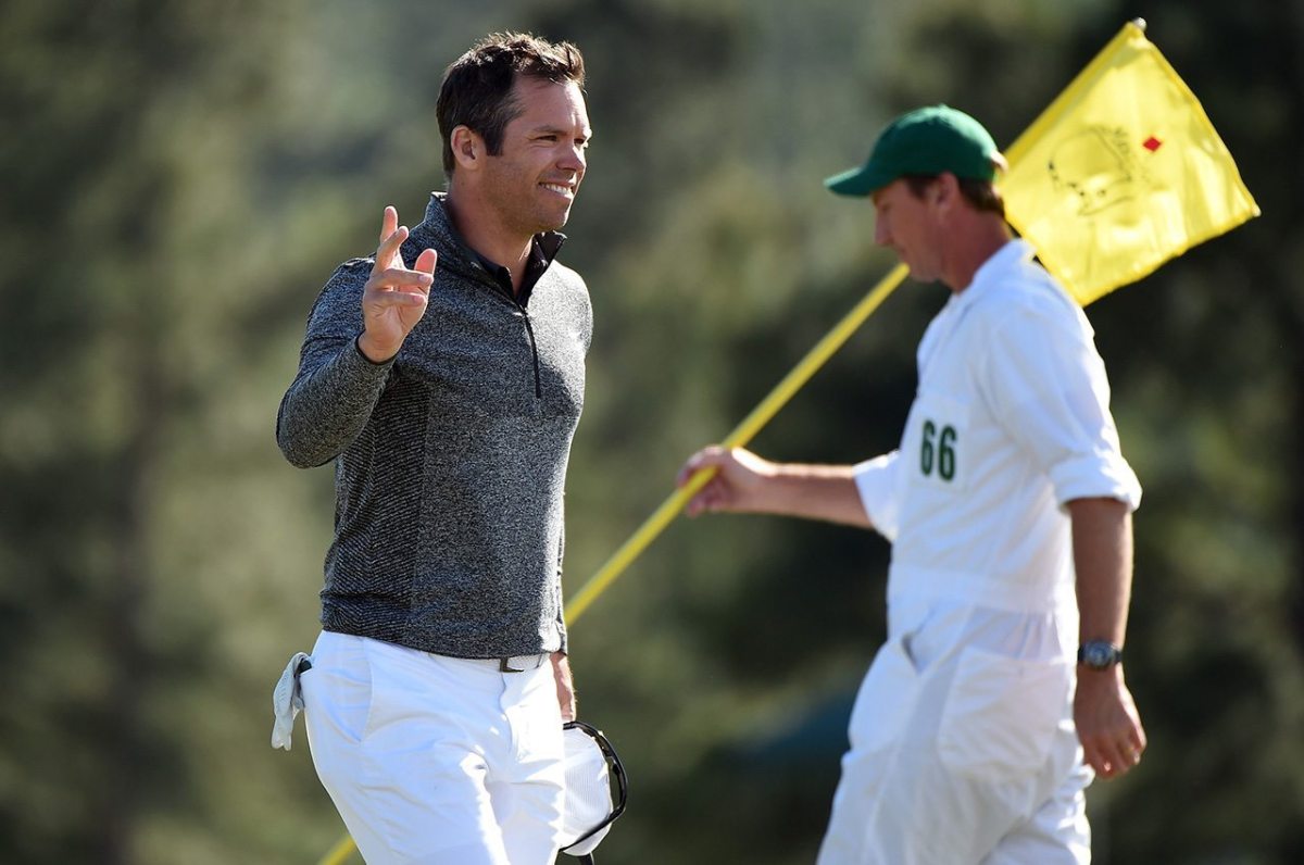 Paul Casey reacts on the 18th green during the final round of the 2016 Masters Tournament at Augusta National Golf Club.