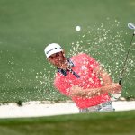 Dustin Johnson plays a shot from a bunker on the second hole during the final round of the 2016 Masters Tournament at Augusta National Golf Club.