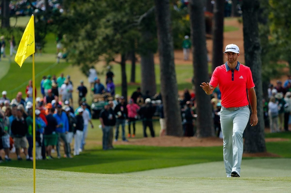 Dustin Johnson reacts on the seventh green during the final round of the 2016 Masters Tournament at Augusta National Golf Club.