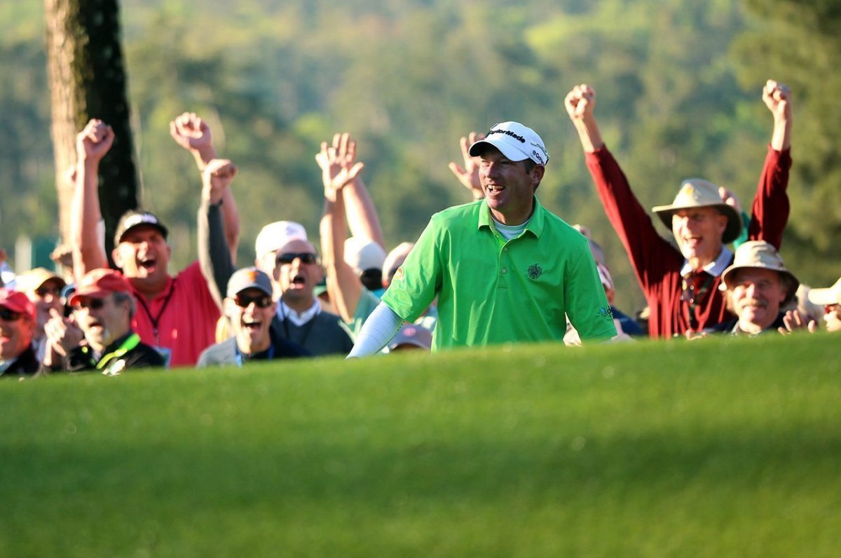 Jim Herman reacts after chipping in for birdie on the first hole during the first round of the 2016 Masters Tournament at Augusta National Golf Club.
