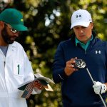Jordan Spieth and caddie Michael Greller prepare to play from the second tee during the first round of the 2016 Masters Tournament at Augusta National Golf Club.