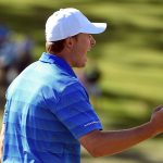 Jordan Spieth reacts to his birdie on the ninth green during the final round of the 2016 Masters Tournament at Augusta National Golf Club.
