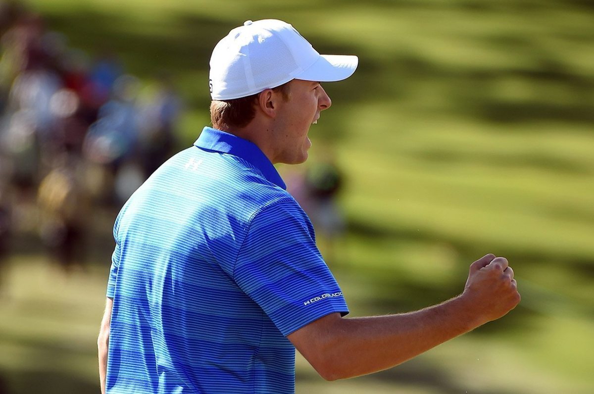 Jordan Spieth reacts to his birdie on the ninth green during the final round of the 2016 Masters Tournament at Augusta National Golf Club.