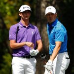Jordan Spieth and Smylie Kaufman stand on the second tee during the final round of the 2016 Masters Tournament at Augusta National Golf Club.