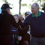 Honorary starters Gary Player (L) and Jack Nicklaus shake hands during the ceremonial tee off to start the first round of the 2016 Masters Tournament at Augusta National Golf Club.