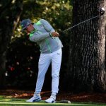 Rickie Fowler plays his shot from the second tee during the first round of the 2016 Masters Tournament at Augusta National Golf Club.