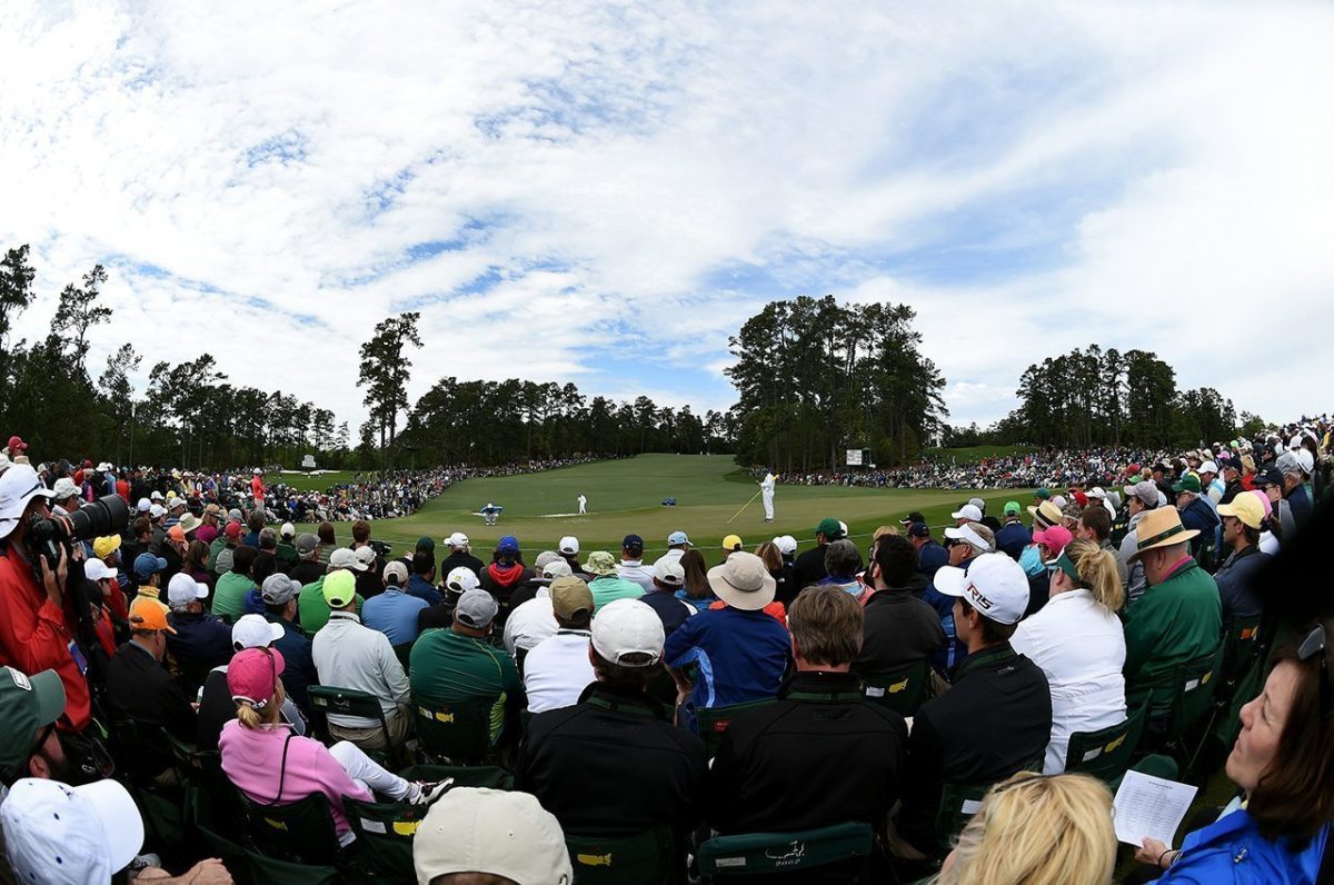 Rory McIlroy lines up a putt on the second green during the final round of the 2016 Masters Tournament at Augusta National Golf Club.