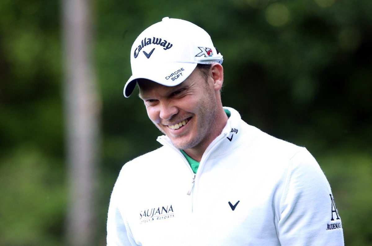 Danny Willett reacts to his birdie on the 13th green during the final round of the 2016 Masters Tournament at Augusta National Golf Club.