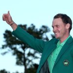 Danny Willett celebrates with the green jacket after winning the final round of the 2016 Masters Tournament at Augusta National Golf Club.