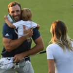 OAKMONT, PA - JUNE 19: Dustin Johnson of the United States celebrates with partner Paulina Gretzky and son Tatum after winning the final round of the U.S. Open at Oakmont Country Club on June 19, 2016 in Oakmont, Pennsylvania. (Photo by Ross Kinnaird/Getty Images)