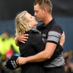 Henrik Stenson with wife Emma after holing a putt for victory during the final round of the British Open.