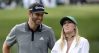 Apr 6, 2016; Augusta, GA, USA; Dustin Johnson with Paulina Gretzky on the 4th green during the Par 3 Contest prior to the 2016 The Masters golf tournament at Augusta National Golf Club. Mandatory Credit: Michael Madrid-USA TODAY Sports