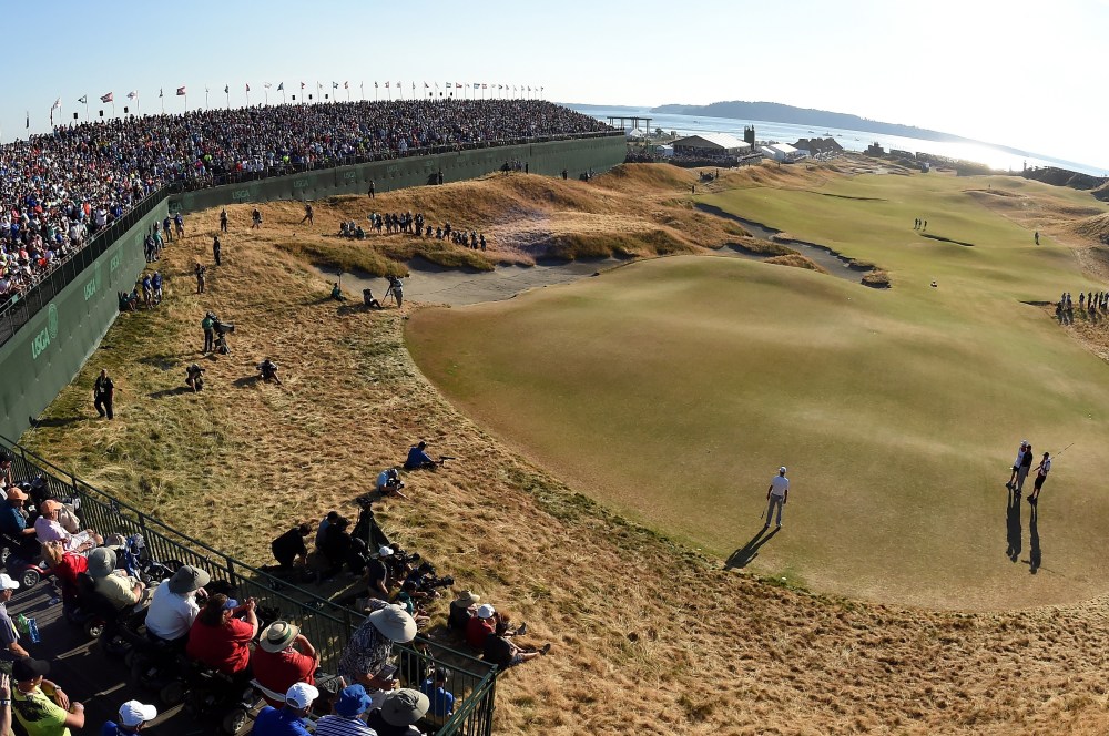 UNIVERSITY PLACE, WA - JUNE 21: Dustin Johnson of the United States watches his missed eagle putt on the 18th green during the final round of the 115th U.S. Open Championship at Chambers Bay on June 21, 2015 in University Place, Washington. (Photo by Harry How/Getty Images)