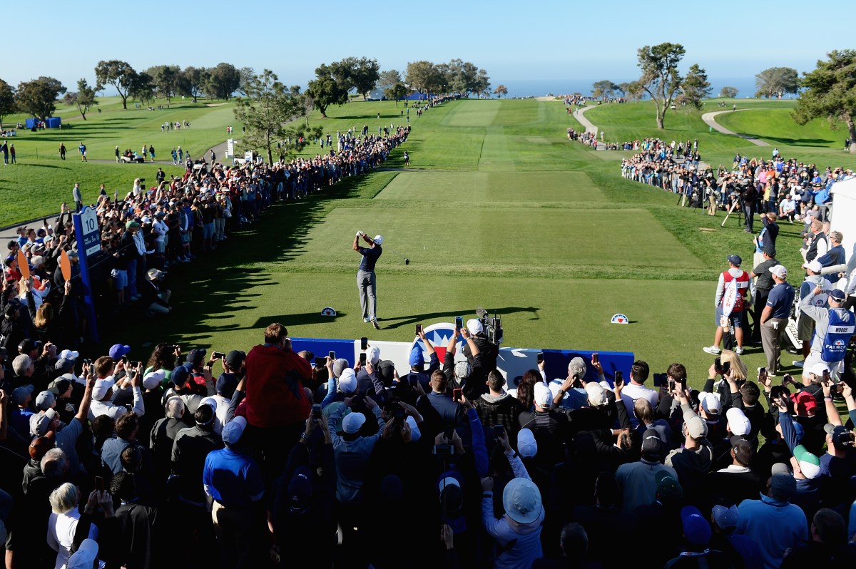Tiger Woods packed the gallery on No. 10 Friday. (Donald Miralle/Getty Images)