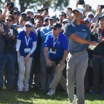 Tiger Woods fires a shot out of the rough on the 17th hole Friday. (Donald Miralle/Getty Images)Tiger Woods fires a shot out of the rough on the 17th hole Friday. (Donald Miralle/Getty Images)Tiger Woods fires a shot out of the rough on the 17th hole Friday. (Donald Miralle/Getty Images)