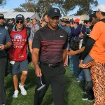 Patrick Reed and Tiger Woods walk to the 16th hole during the first round of the Farmers Insurance Open at Torrey Pines. (Stan Badz/PGA TOUR)