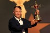 Captain Davis Love III of the United States holds the Ryder Cup at the closing ceremonies after defeating Europe during singles matches of the 2016 Ryder Cup at Hazeltine National Golf Club on October 2, 2016 in Chaska, Minnesota. (Photo by Mike Ehrmann/PGA of America via Getty Images)