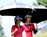 WEST DES MOINES, IA - AUGUST 18: Danielle Kang and Michelle Wie of the United States leaves the ninth tee during the afternoon four-ball matches of the Solheim Cup at the Des Moines Golf and Country Club on August 18, 2017 in West Des Moines, Iowa. (Photo by Harry How/Getty Images)
