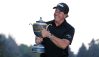 MEXICO CITY, MEXICO - MARCH 04: Phil Mickelson gives a thumb up to fans as he holds the Gene Sarazen Cup after winning the World Golf Championships-Mexico Championship on a playoff hole at Club De Golf Chapultepec on March 4, 2018 in Mexico City, Mexico. (Photo by Rob Carr/Getty Images)