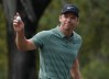 Mar 11, 2018; Palm Harbor, FL, USA; Paul Casey waives ti the gallery after putting for par on the 16th during the final round of the Valspar Championship golf tournament at Innisbrook Resort - Copperhead Course. Mandatory Credit: Jasen Vinlove-USA TODAY Sports