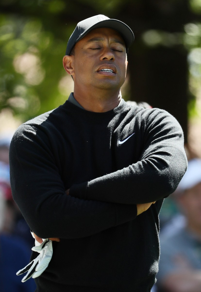 iger Woods was not happy with his tee shot on the fourth hole Thursday at Augusta National Golf Club. (Jamie Squire/Getty Images)