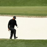 Tiger Woods found the bunker on No. 4 at Augusta Thursday. (amie Squire/Getty Images)