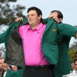 AUGUSTA, GA - APRIL 08: Patrick Reed of the United States is awarded the Green Jacket by Sergio Garcia of Spain during the Green Jacket Ceremony after winning the 2018 Masters Tournament at Augusta National Golf Club on April 8, 2018 in Augusta, Georgia. (Photo by Jamie Squire/Getty Images)