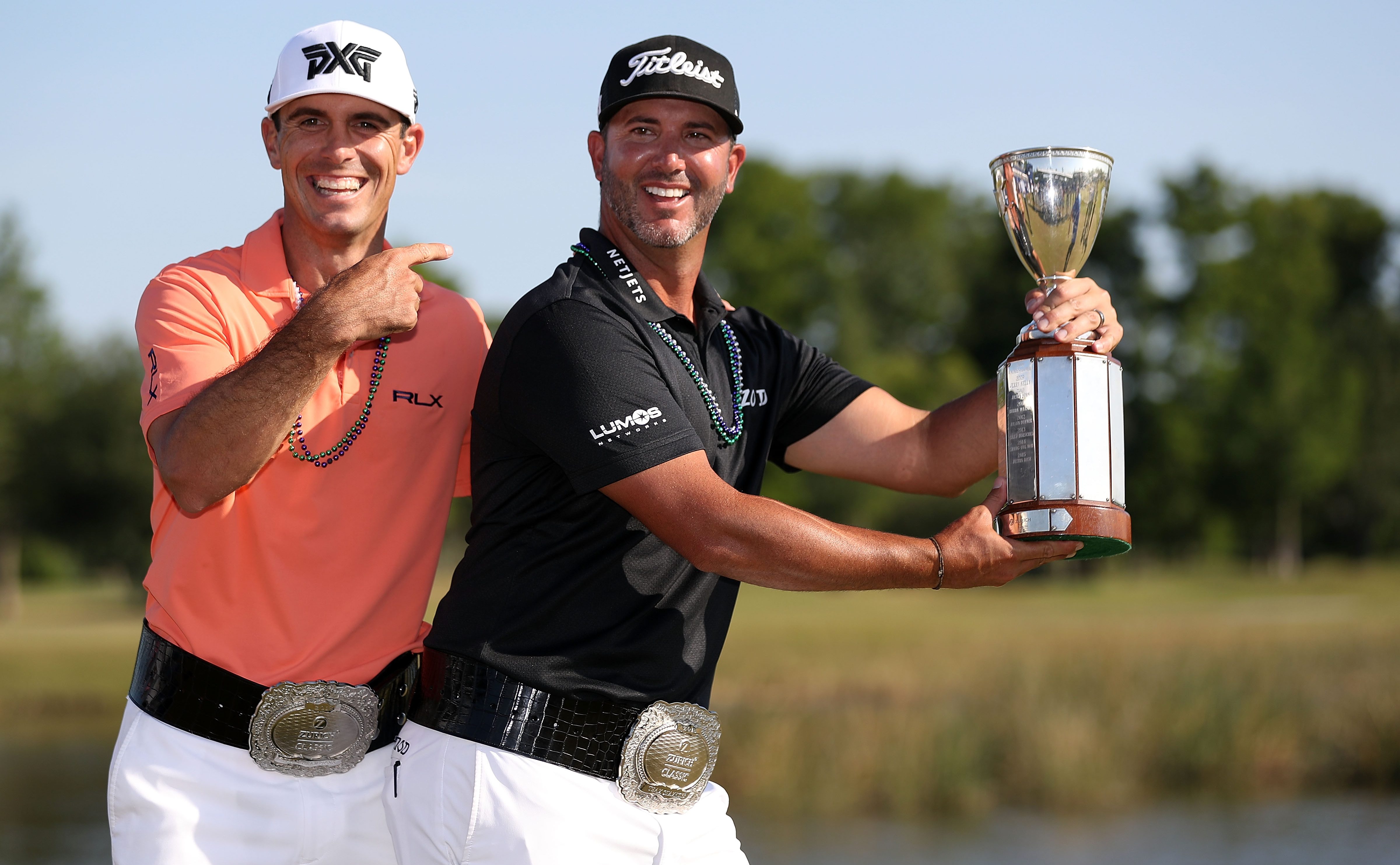 AVONDALE, LA - APRIL 29: Billy Horschel and Scott Piercy pose with the trophy and commerative belts during the final round of the Zurich Classic at TPC Louisiana on April 29, 2018 in Avondale, Louisiana. (Photo by Chris Graythen/Getty Images)