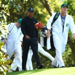 Tiger Woods and caddie Joe Lacava take a stoll toward No. 2 at the Masters. (Rob Schumacher-USA TODAY Sports)