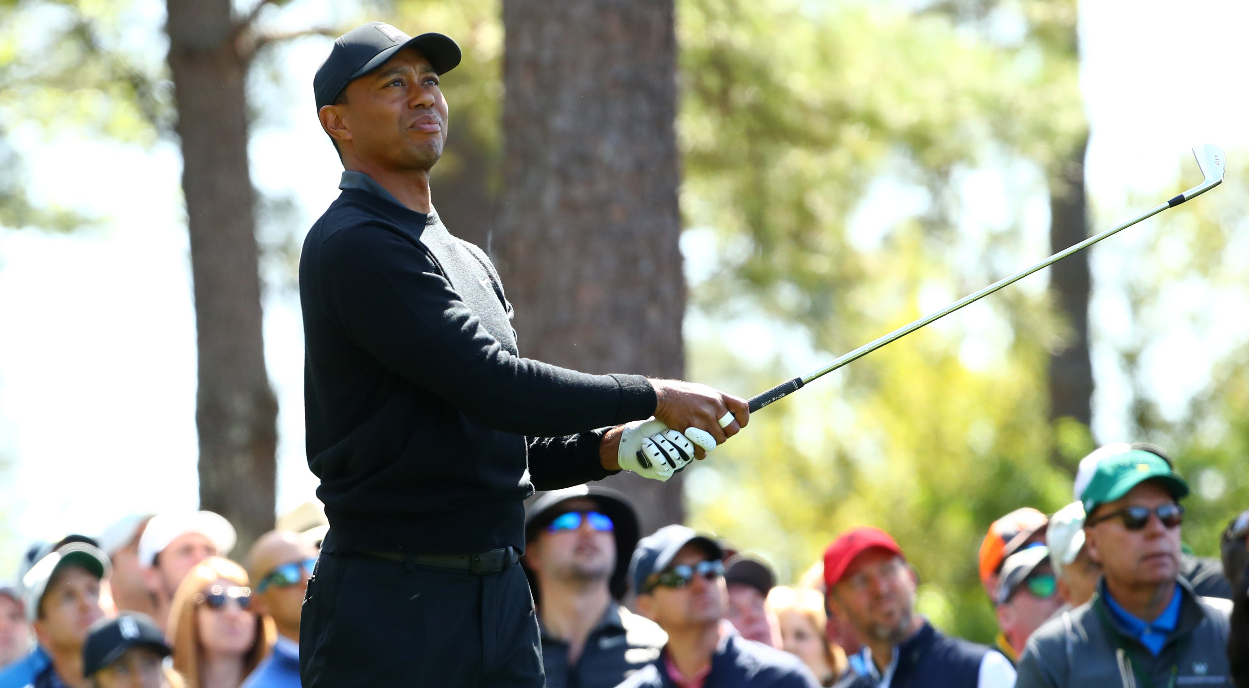 Apr 5, 2018; Augusta, GA, USA; Tiger Woods hits his tee shot on the 4th hole during the first round of the Masters golf tournament at Augusta National Golf Club. Mandatory Credit: Rob Schumacher-USA TODAY Sports