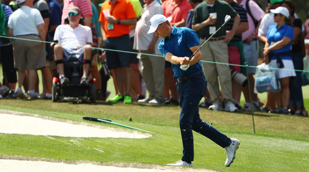 Apr 6, 2018; Augusta, GA, USA; Jordan Spieth reacts by swinging his club after hitting into a bunker on the 7th hole during the second round of the Masters golf tournament at Augusta National Golf Club. Mandatory Credit: Rob Schumacher-USA TODAY Sports