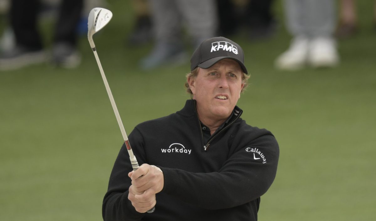 Phil Mickelson hits out of a bunker on the 2nd hole during the final round of the Masters golf tournament at Augusta National Golf Club. (Michael Madrid-USA TODAY Sports)