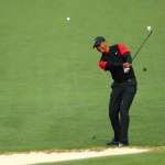 Tiger Woods chips onto the 2nd green. (Rob Schumacher/USA TODAY Sports)