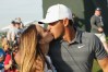 SOUTHAMPTON, NY - JUNE 17: Brooks Koepka of the United States kisses girlfriend Jena Sims as they walk off the 18th green during the final round of the 2018 U.S. Open at Shinnecock Hills Golf Club on June 17, 2018 in Southampton, New York. (Photo by Streeter Lecka/Getty Images)