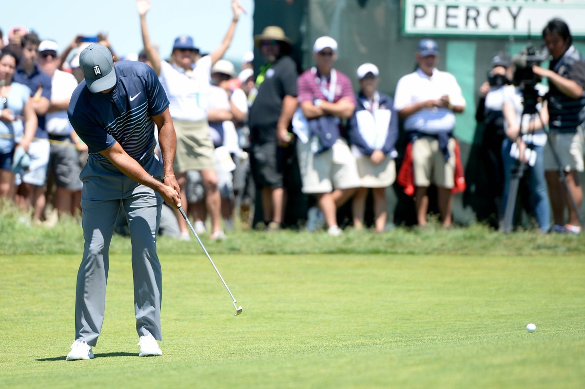 Jun 14, 2018; Southampton, NY, USA; Tiger Woods putts the first green during the first round of the U.S. Open golf tournament at Shinnecock Hills GC - Shinnecock Hills Golf C. Mandatory Credit: Dennis Schneidler-USA TODAY Sports