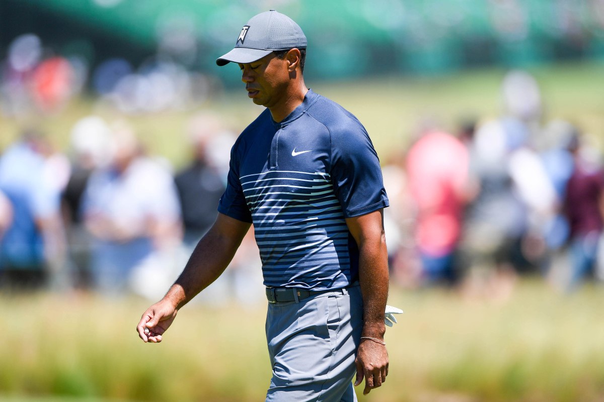 Jun 14, 2018; Southampton, NY, USA; Tiger Woods walks the first fairway during the first round of the U.S. Open golf tournament at Shinnecock Hills GC - Shinnecock Hills Golf C. Mandatory Credit: Shanna Lockwood-USA TODAY Sports