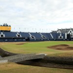 The 18th green, scoreboard, grandstand and hotel await all the mayhem that is The Open. (Photo by Andrew Redington/Getty Images)