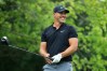 ST. LOUIS, MO - AUGUST 07: Brooks Koepka of the United States smiles after playing a shot during a practice round prior to the 2018 PGA Championship at Bellerive Country Club on August 7, 2018 in St. Louis, Missouri. (Photo by Andy Lyons/Getty Images)