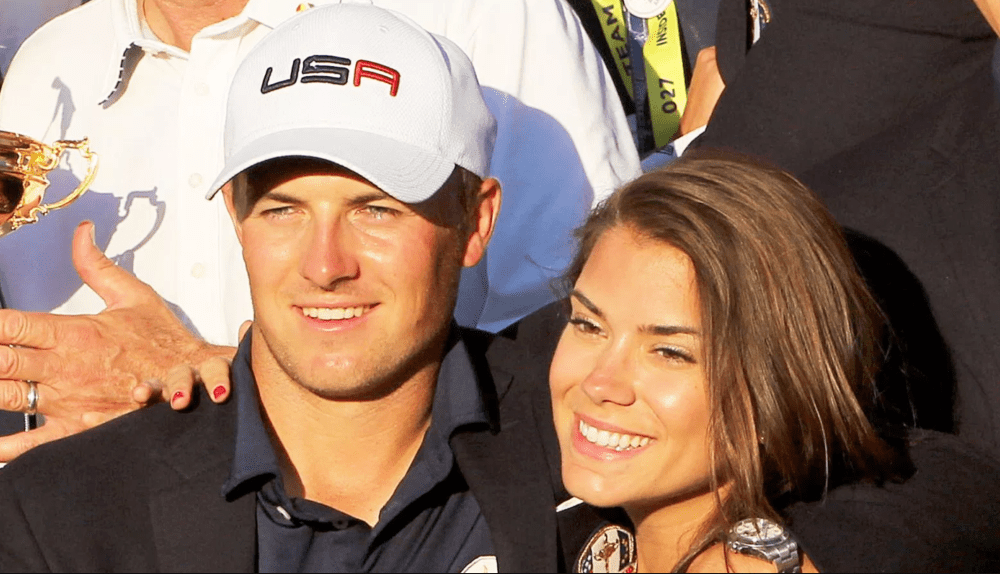 Jordan Spieth and Annie Verret celebrate with the Ryder Cup after the United States victory in the Ryder Cup tournament at Hazeltine National Golf Club on October 02, 2016 in Chaska, Minnesota. Tim Clayton/Corbis via Getty Images
