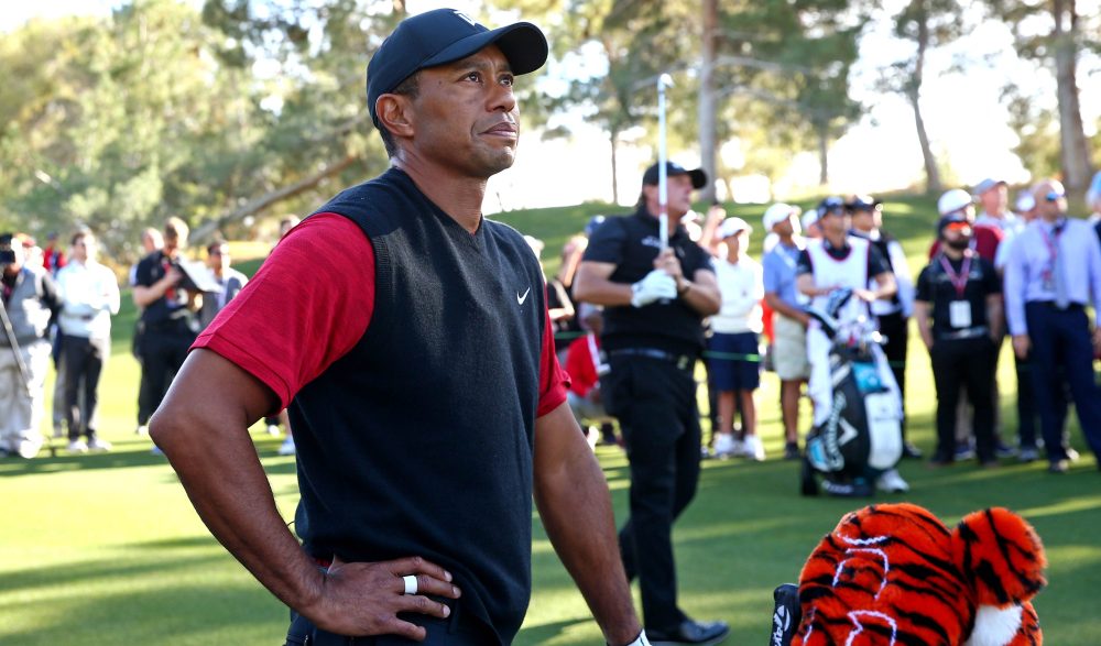 Nov 23, 2018; Las Vegas, NV, USA; Tiger Woods watch a shot by Phil Mickelson on the sixth hole during The Match: Tiger vs Phil golf match at Shadow Creek Golf Course. Mandatory Credit: Rob Schumacher-USA TODAY Sports