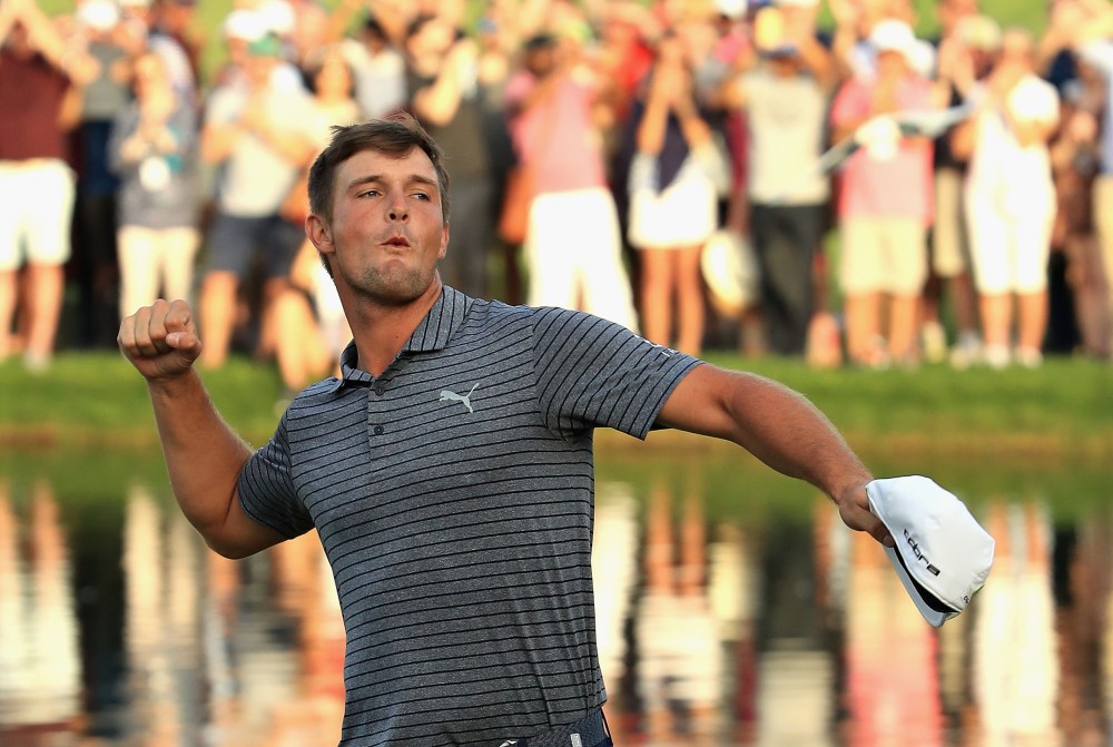 Bryson Dechambeau celebrates winning the Omega Dubai Desert Classic at Emirates Golf Club on Jan. 27, 2019 in Dubai, United Arab Emirates.