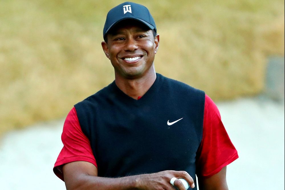 Nov 23, 2018; Las Vegas, NV, USA; Tiger Woods reacts to chipping in for birdie on the 17th hole during The Match: Tiger vs Phil golf match at Shadow Creek Golf Course. Mandatory Credit: Rob Schumacher-USA TODAY Sports