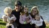 LA QUINTA, CA - JANUARY 25: Phil Mickelson celebrates his win as he poses for a portrait with his wife Amy and their three children (L-R) two-year old Sophia Isabel, four-year old Amanda Brynn and 10-month old Evan Samuel after the final round of the Bob Hope Chrysler Classic at PGA West on January 25, 2004 in La Quinta, California. (Photo by Scott Halleran/Getty Images)