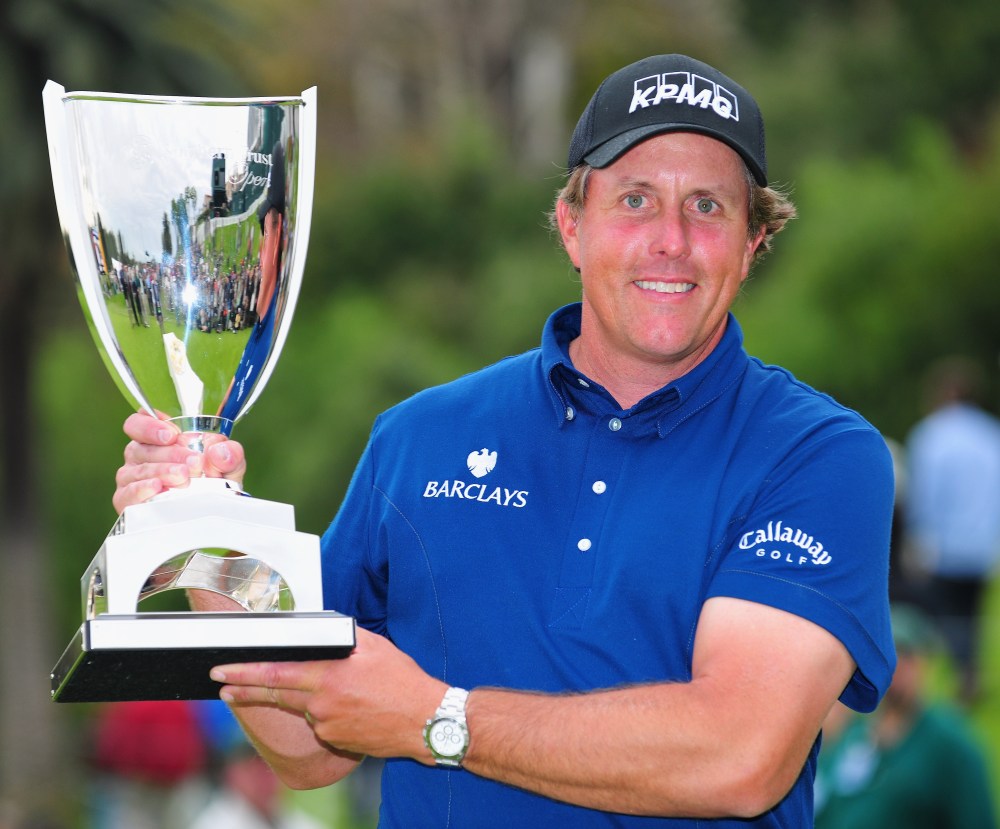 PACIFIC PALISADES, CA - FEBRUARY 22: Phil Mickelson of USA with the trophy after winning the final round of the Northern Trust Open at the Riviera Country Club February 22, 2009 in Pacific Palisades, California. (Photo by Stuart Franklin/Getty Images)