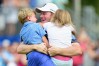 Brandt Snedeker celebrates with his children Austin and Lily on the 18th green after making his birdie putt during the final round to win the Wyndham Championship at Sedgefield Country Club on August 19, 2018 in Greensboro, North Carolina. (Photo by Jared C. Tilton/Getty Images)