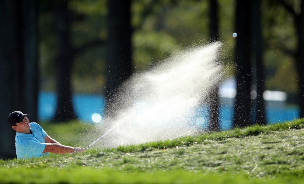 Patrick Reed plays a shot from a bunker on the second hole during the second round of the U.S. Open at Winged Foot Golf Club - West