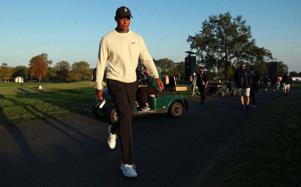Tiger Woods walks over to the ninth hole during the second round of the U.S. Open golf tournament at Winged Foot Golf Club - West